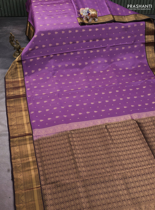 Pure soft silk saree pastel purple and coffee brown with allover zari woven buttas and rich zari woven border