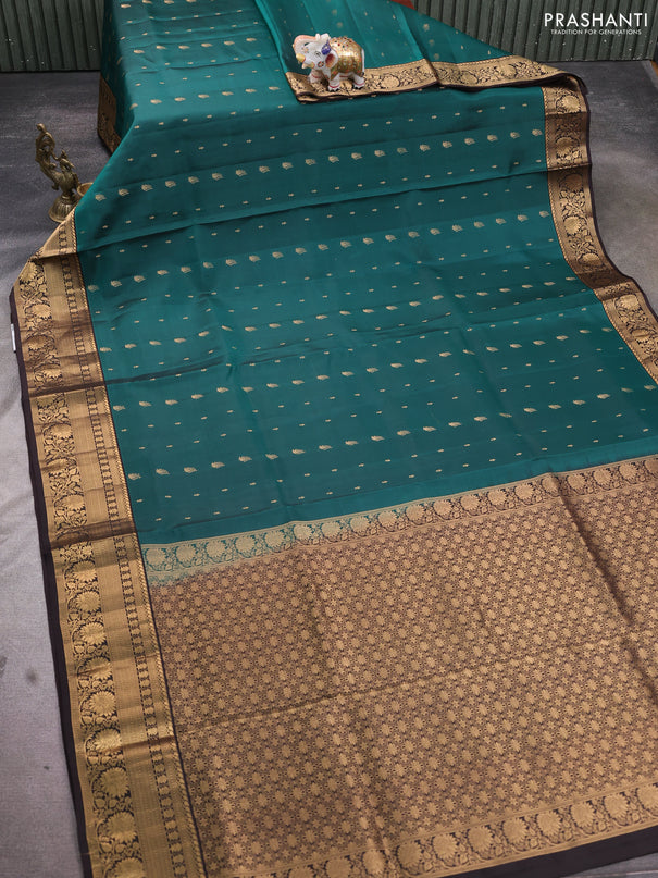 Pure soft silk saree peacock green and deep coffee brown with allover zari woven buttas and rich zari woven border
