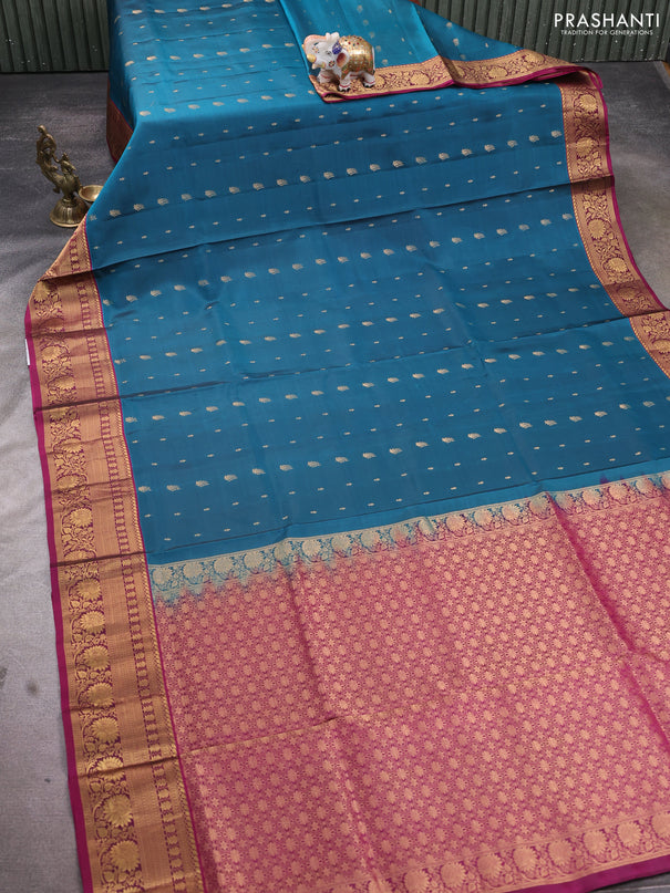 Pure soft silk saree peacock green and magenta pink with allover zari woven buttas and rich zari woven border