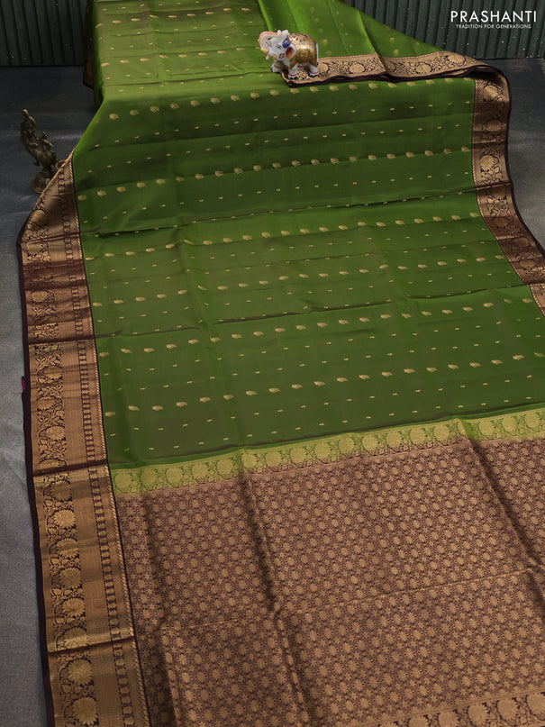 Pure soft silk saree green and coffee brown with allover zari woven buttas and rich zari woven border