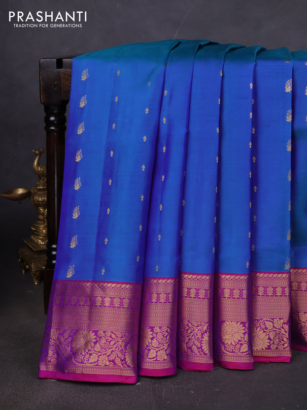 Pure soft silk saree dual shade of cs blue and magenta pink with allover zari woven buttas and rich zari woven border