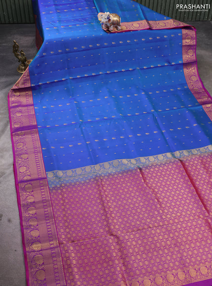 Pure soft silk saree dual shade of cs blue and magenta pink with allover zari woven buttas and rich zari woven border