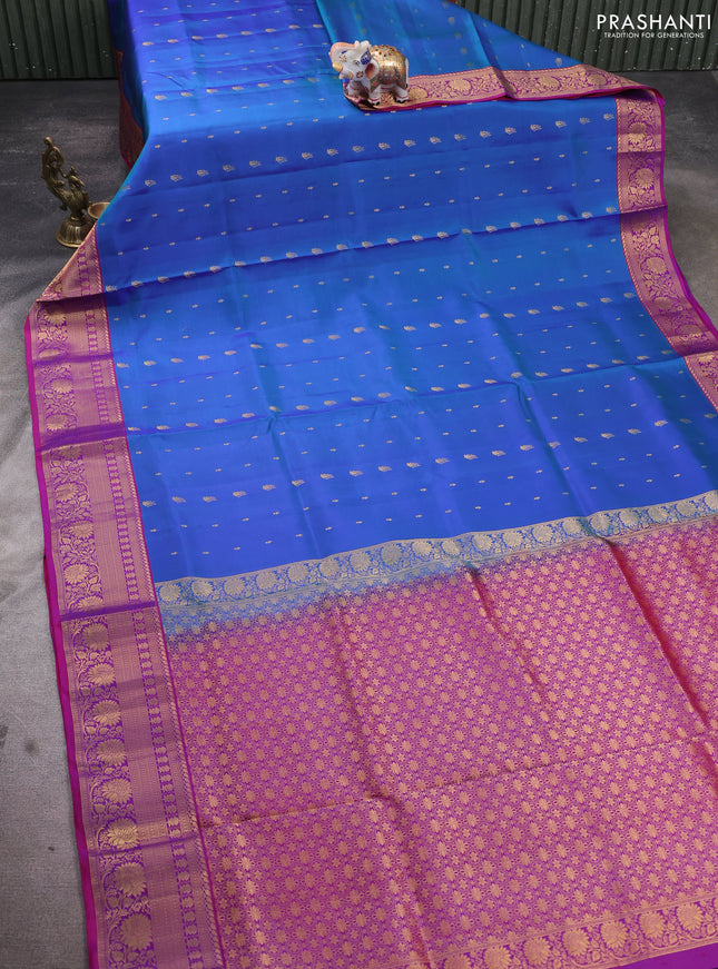 Pure soft silk saree dual shade of cs blue and magenta pink with allover zari woven buttas and rich zari woven border
