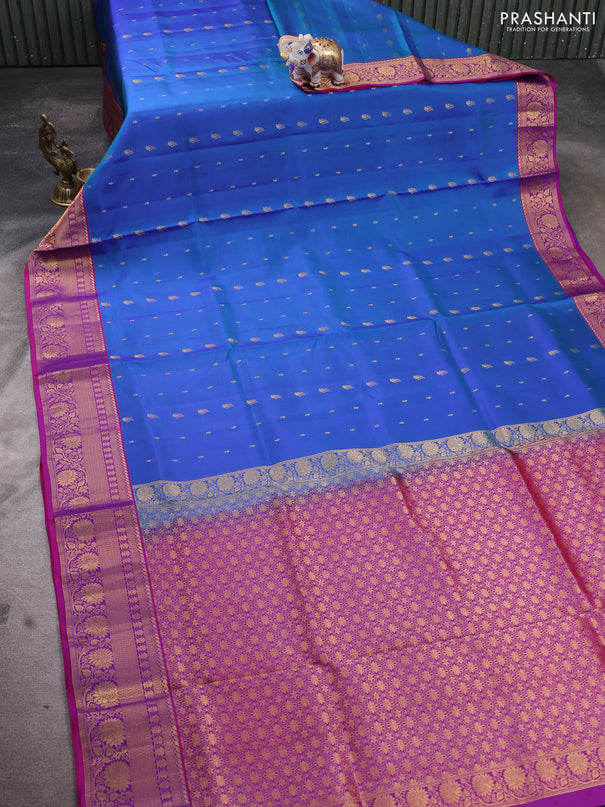 Pure soft silk saree dual shade of cs blue and magenta pink with allover zari woven buttas and rich zari woven border