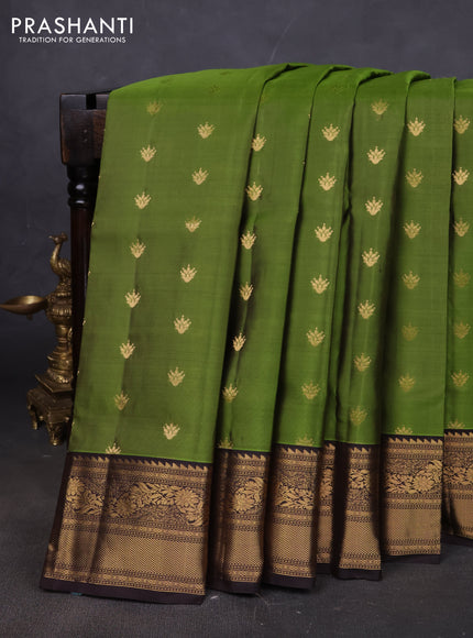 Pure soft silk saree green and coffee brown with allover zari woven buttas and rich zari woven border