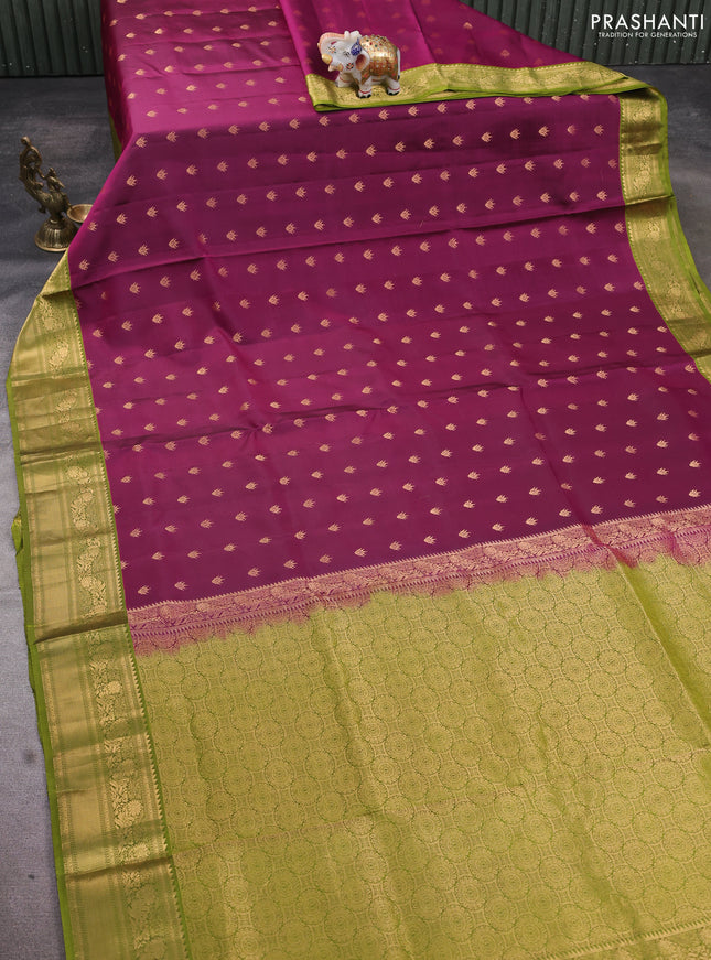Pure soft silk saree magenta pink and green with allover zari woven buttas and rich zari woven border