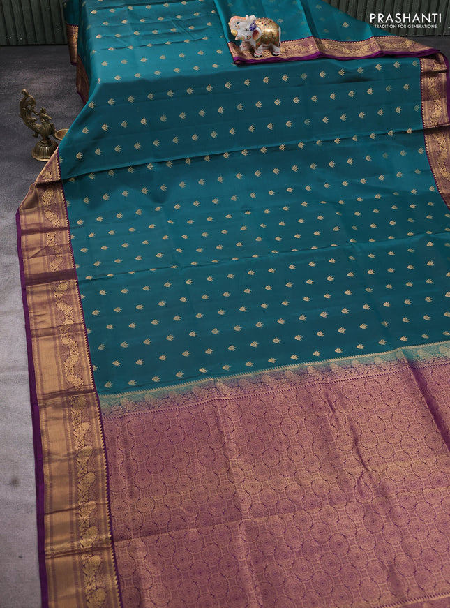 Pure soft silk saree peacock green and deep purple with allover zari woven buttas and rich zari woven border