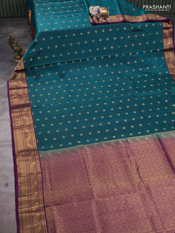 Pure soft silk saree peacock green and deep purple with allover zari woven buttas and rich zari woven border
