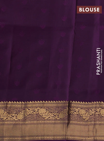 Pure soft silk saree peacock green and deep purple with allover zari woven buttas and rich zari woven border