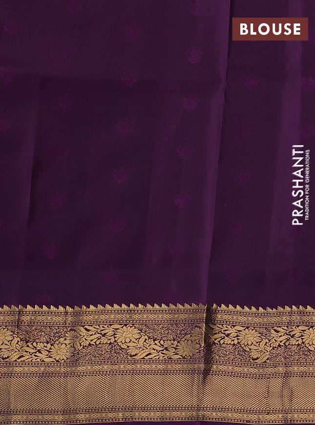Pure soft silk saree peacock green and deep purple with allover zari woven buttas and rich zari woven border