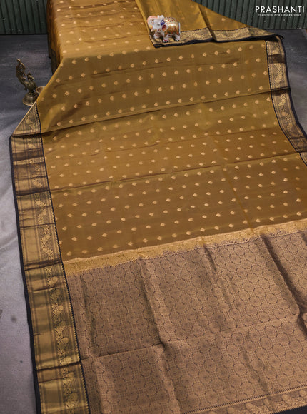 Pure soft silk saree mehendi green and black with allover zari woven buttas and rich zari woven border