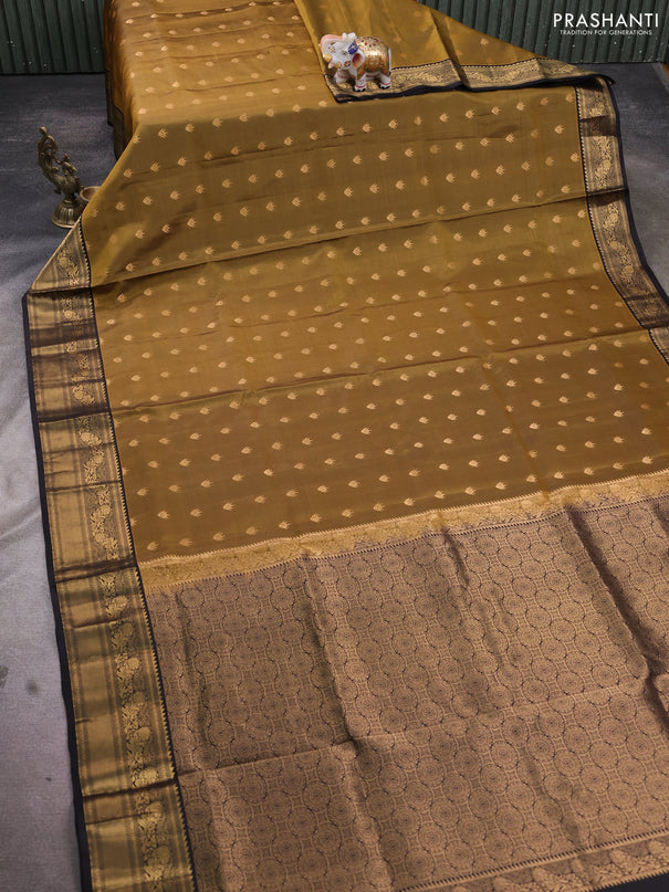 Pure soft silk saree mehendi green and black with allover zari woven buttas and rich zari woven border