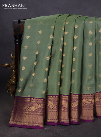Pure soft silk saree pastel green and deep purple with allover zari woven buttas and rich zari woven border