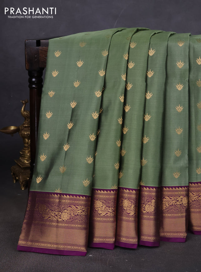 Pure soft silk saree pastel green and deep purple with allover zari woven buttas and rich zari woven border