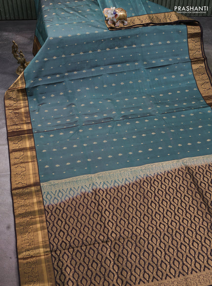 Pure soft silk saree pastel blue and coffee brown with allover zari woven buttas and rich zari woven border