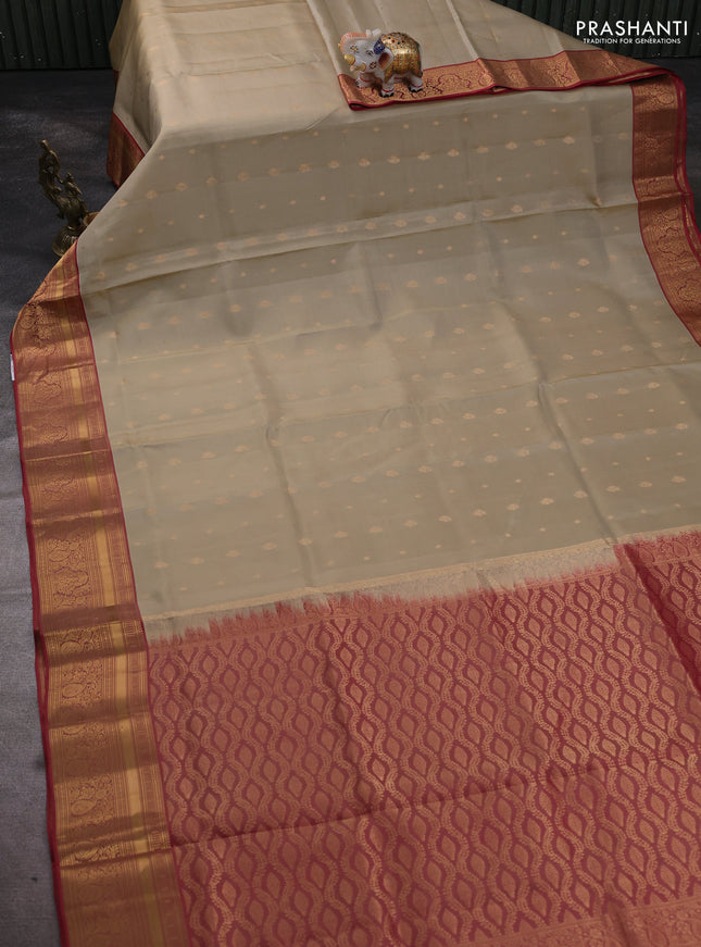 Pure soft silk saree beige and dual shade of pink with allover zari woven buttas and rich zari woven border