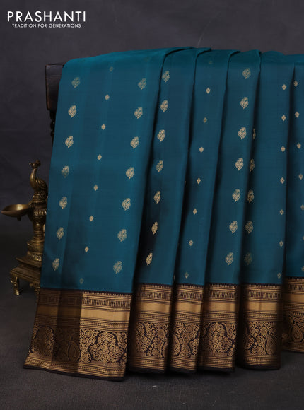 Pure soft silk saree peacock green and coffee brown with allover zari woven buttas and rich zari woven border