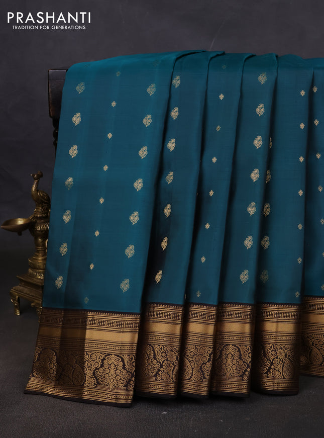 Pure soft silk saree peacock green and coffee brown with allover zari woven buttas and rich zari woven border