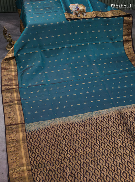 Pure soft silk saree peacock green and coffee brown with allover zari woven buttas and rich zari woven border