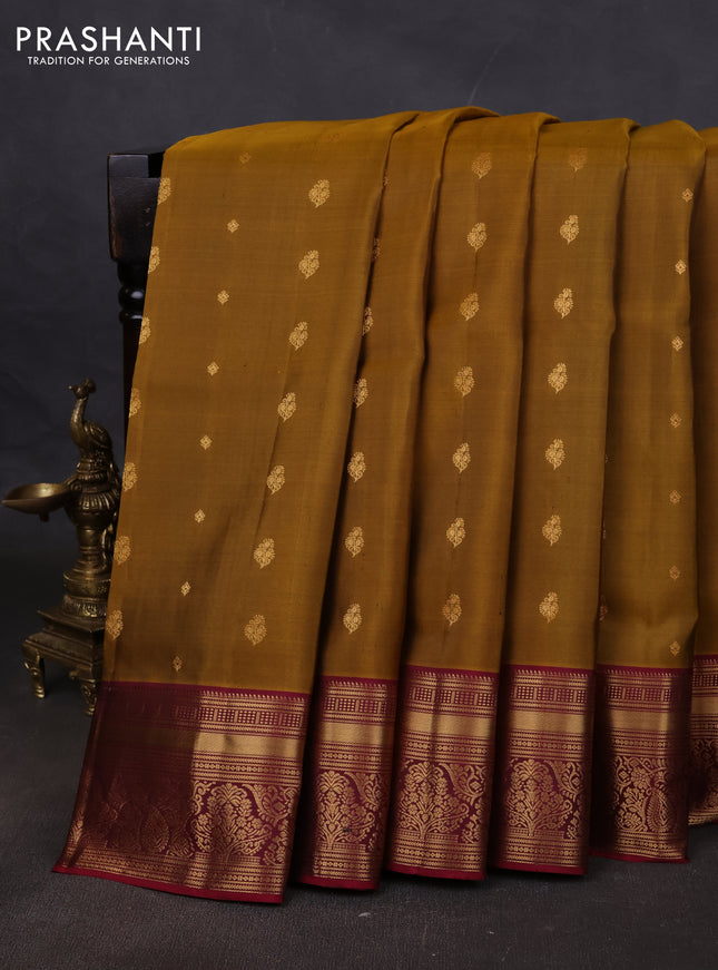 Pure soft silk saree dark mustard and dark magenta pink with allover zari woven buttas and rich zari woven border
