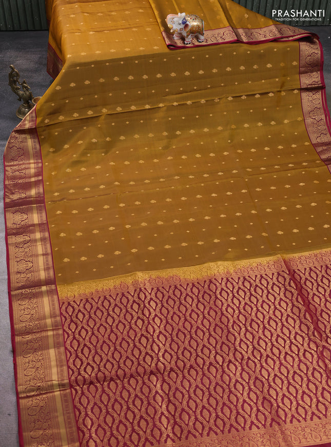 Pure soft silk saree dark mustard and dark magenta pink with allover zari woven buttas and rich zari woven border