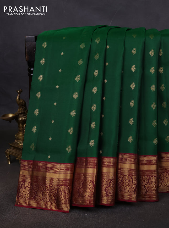 Pure soft silk saree green and dark magenta pink with allover zari woven buttas and rich zari woven border