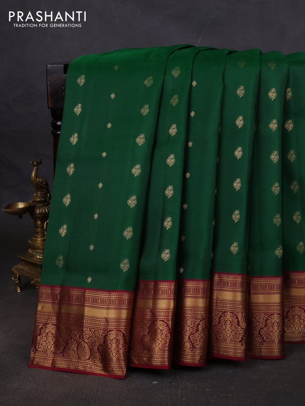 Pure soft silk saree green and dark magenta pink with allover zari woven buttas and rich zari woven border