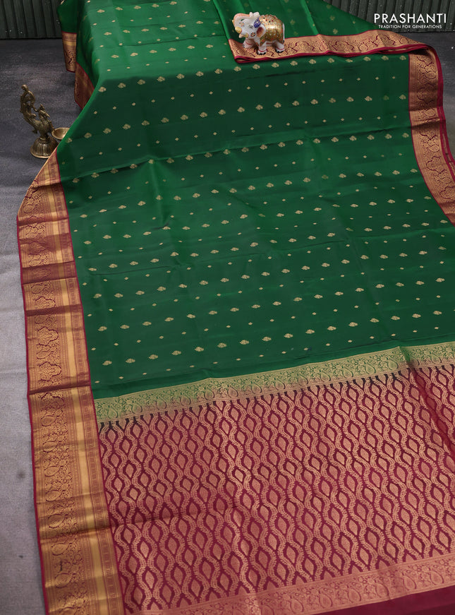 Pure soft silk saree green and dark magenta pink with allover zari woven buttas and rich zari woven border