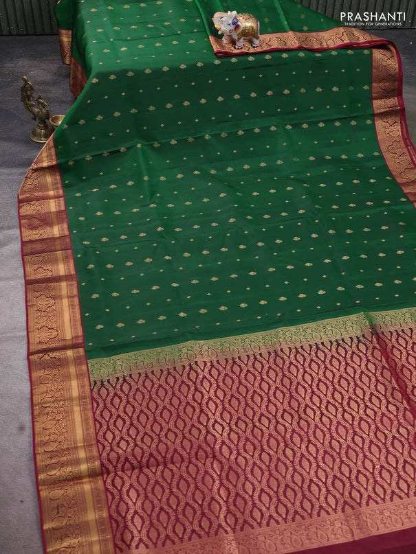 Pure soft silk saree green and dark magenta pink with allover zari woven buttas and rich zari woven border