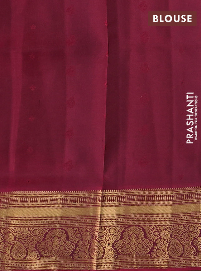 Pure soft silk saree green and dark magenta pink with allover zari woven buttas and rich zari woven border