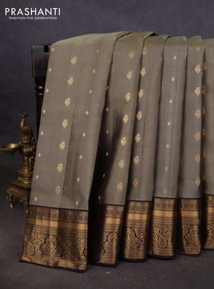 Pure soft silk saree elaichi green and coffee brown with allover zari woven buttas and rich zari woven border