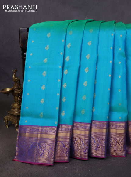 Pure soft silk saree dual shade of teal bluish green and purple with allover zari woven buttas and rich zari woven border