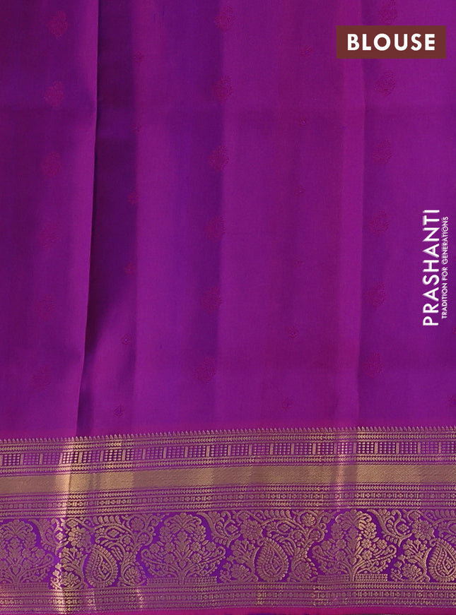 Pure soft silk saree dual shade of teal bluish green and purple with allover zari woven buttas and rich zari woven border