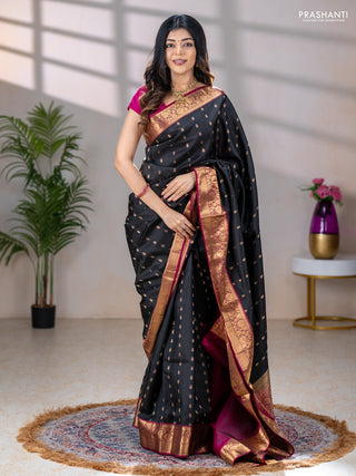 Pure soft silk saree black and dark magenta pink with allover zari woven buttas and rich zari woven border