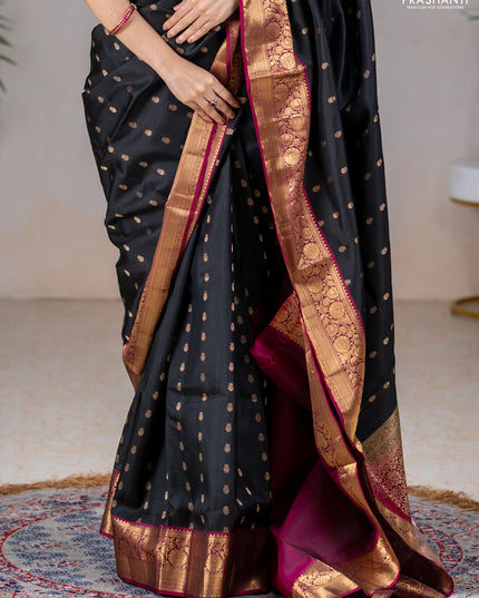 Pure soft silk saree black and dark magenta pink with allover zari woven buttas and rich zari woven border