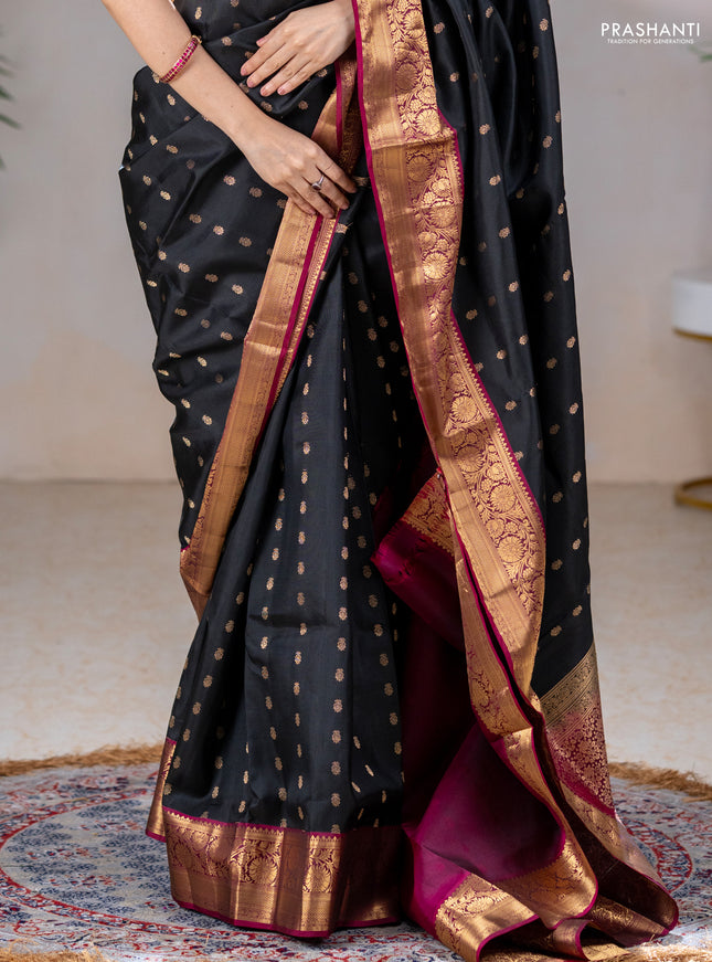 Pure soft silk saree black and dark magenta pink with allover zari woven buttas and rich zari woven border