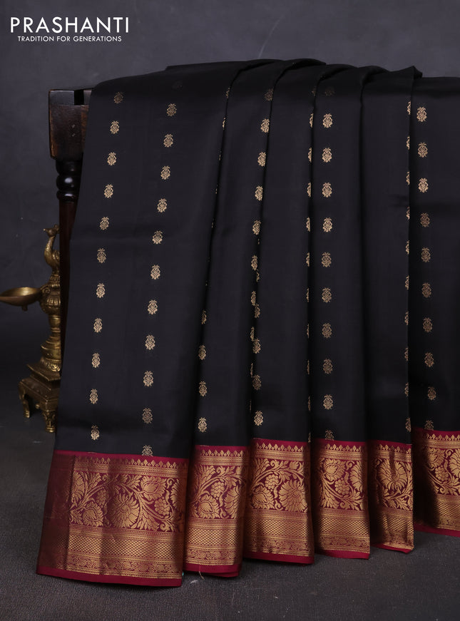 Pure soft silk saree black and dark magenta pink with allover zari woven buttas and rich zari woven border