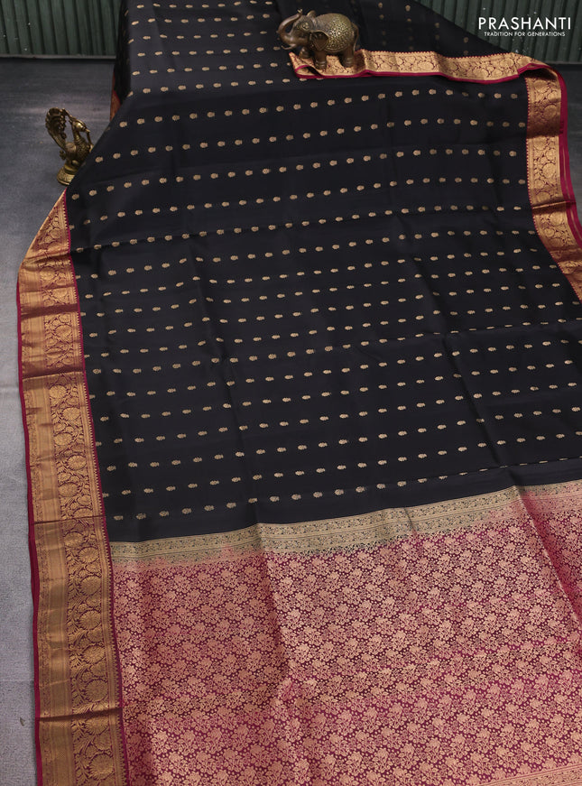 Pure soft silk saree black and dark magenta pink with allover zari woven buttas and rich zari woven border