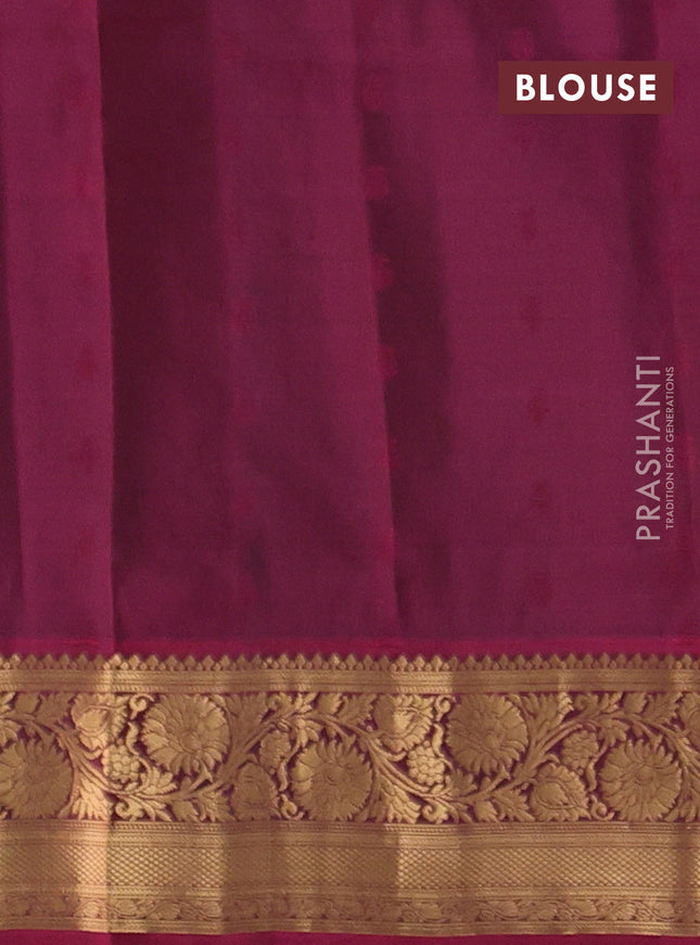 Pure soft silk saree black and dark magenta pink with allover zari woven buttas and rich zari woven border