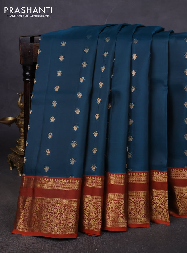 Pure soft silk saree peacock blue and rustic orange with allover zari woven buttas and zari woven border