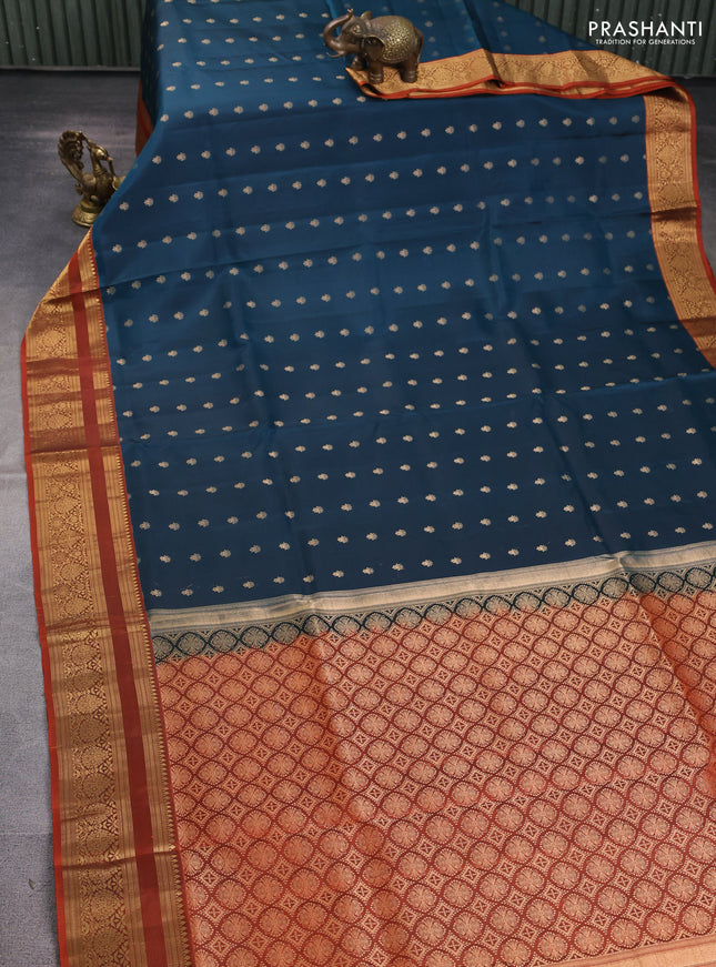 Pure soft silk saree peacock blue and rustic orange with allover zari woven buttas and zari woven border