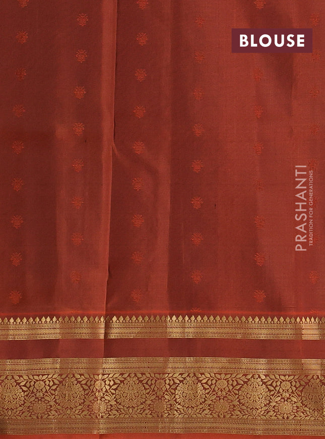 Pure soft silk saree peacock blue and rustic orange with allover zari woven buttas and zari woven border