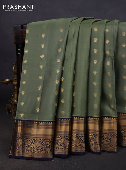 Pure soft silk saree elaichi green and navy blue with allover zari woven buttas and zari woven border