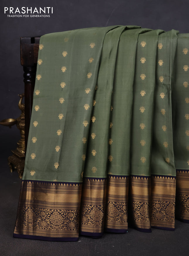 Pure soft silk saree elaichi green and navy blue with allover zari woven buttas and zari woven border