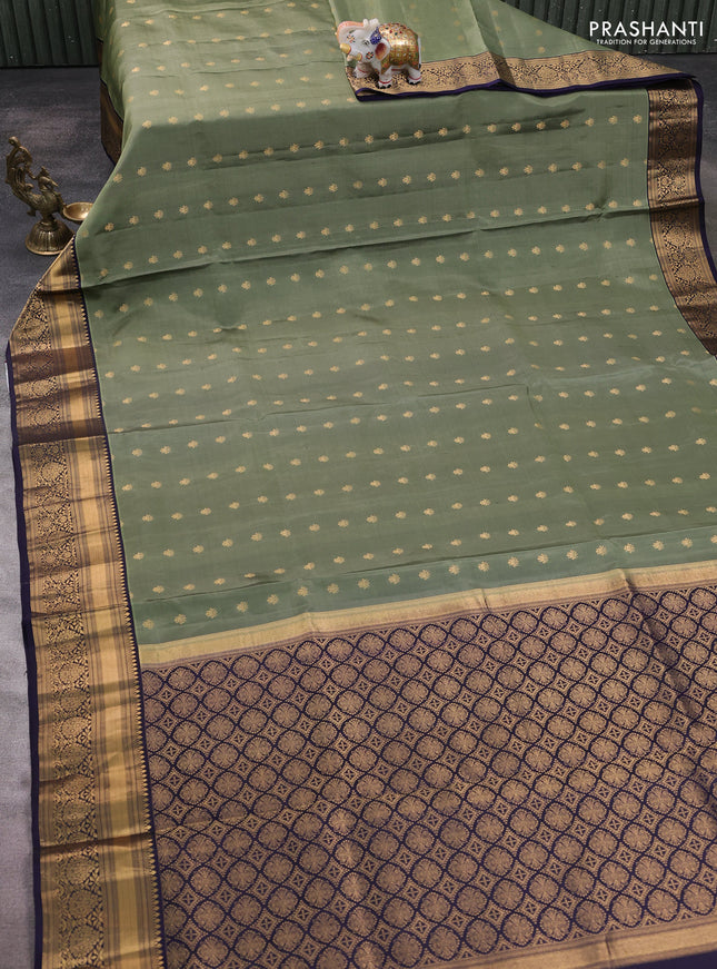 Pure soft silk saree elaichi green and navy blue with allover zari woven buttas and zari woven border
