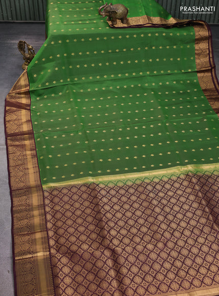 Pure soft silk saree green and wine shade with allover zari woven buttas and zari woven border