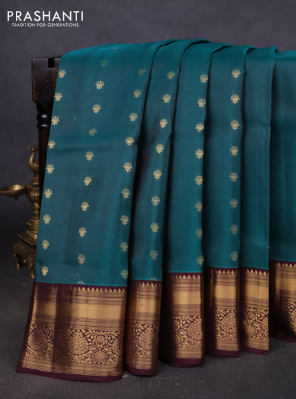 Pure soft silk saree peacock green and wine shade with allover zari woven buttas and zari woven border