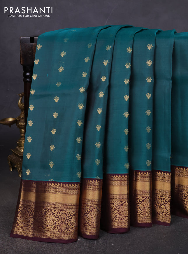 Pure soft silk saree peacock green and wine shade with allover zari woven buttas and zari woven border