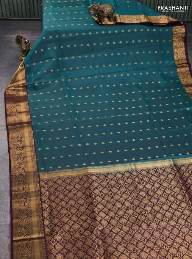 Pure soft silk saree peacock green and wine shade with allover zari woven buttas and zari woven border