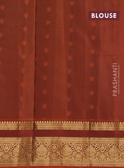 Pure soft silk saree bottle green and rustic orange with allover zari woven buttas and zari woven border